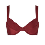 Front view of the KIKKA bikini top in Mosto, showcasing a minimalist shape with a deep burgundy tone.