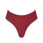 Front view of the KIKKA bikini bottom in deep berry Mosto, low-rise with gold-accented side ties.