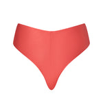 Back view of the KIKKA bikini bottom in Orange Soda, seamless and cheeky with side-tie details.
