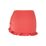 LOLA skirt bottom in Orange Soda, back view showing feminine silhouette.