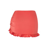 LOLA skirt bottom in Orange Soda, back view showing feminine silhouette.