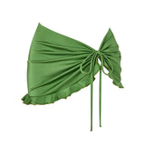 lola KIKKA green swim skirt, front view featuring ruched tie design and ruffle hem.